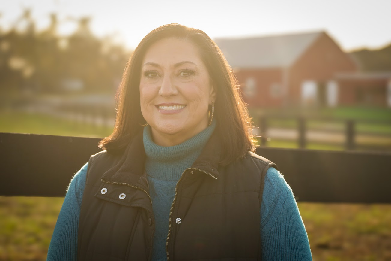 Golden-hour portrait by the barn